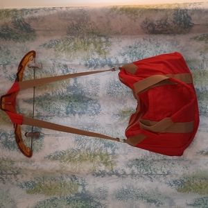 1970's red and tan duffle bag crossbody or handles great condition